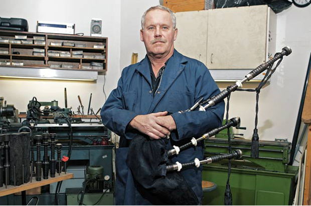 Craftsman with a handmade bagpipe