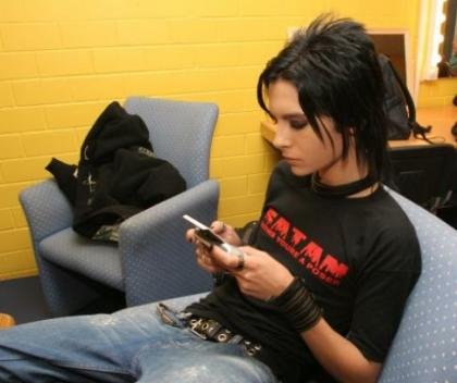 doingsomethingwithhiscellphone.jpg